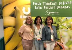 Gloria Smith, Daniella Velazquez de Leon, and Mayra Velazquez de Leon with Organics Unlimited promoting organic bananas.